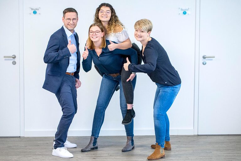 Teamfoto vier Personen Hörakustiker